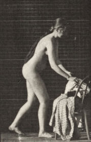 Plate 415 Toilet, preparing to put on clothing — figure reference